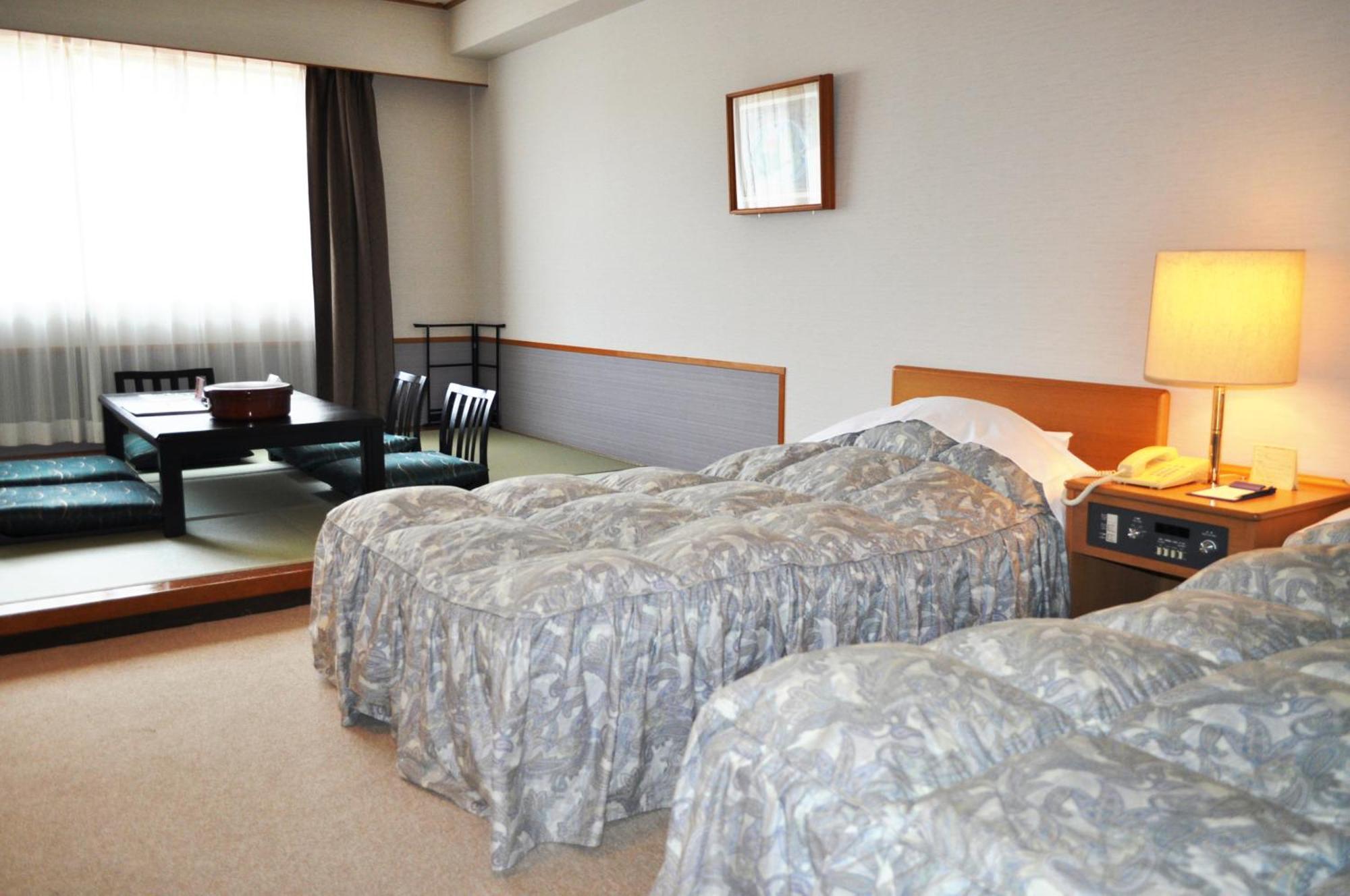 Tateyama Kokusai Hotel Toyama Station Chambre photo
